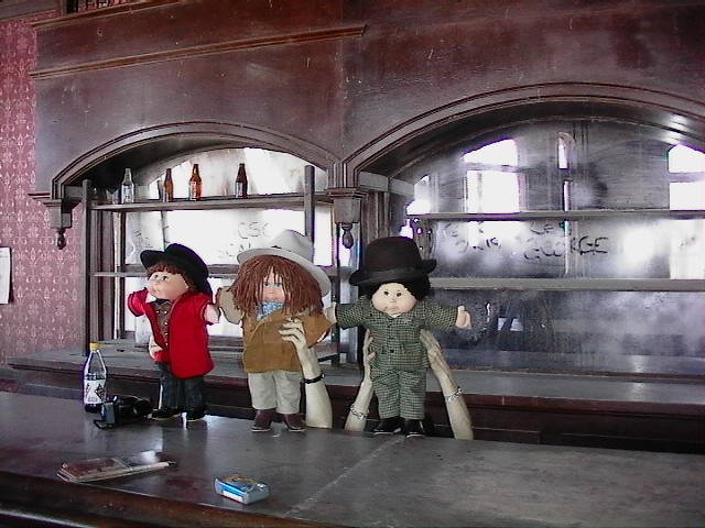 Vin, Ezra and JD standing on the bar